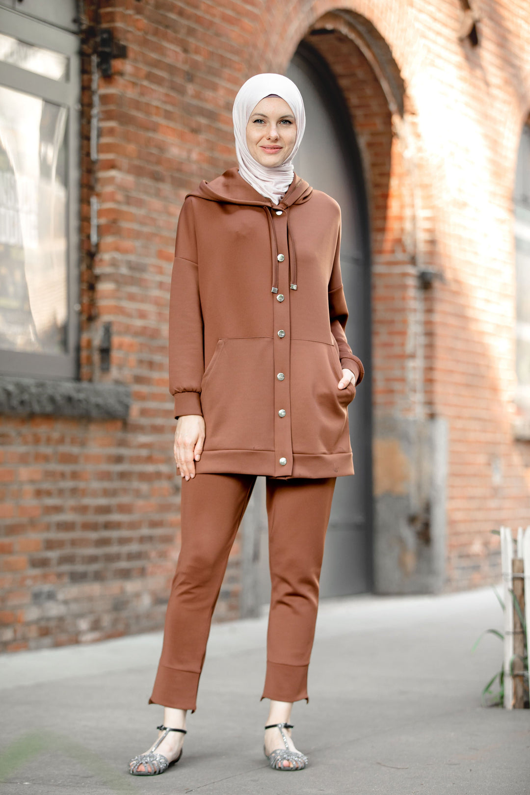 Woman in brown hijab wearing Button Down Hoodie Sweatshirt and Pants Set on clearance