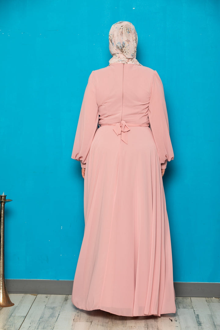 Peach-colored modest dress with chiffon long sleeve and belt included for elegant styling