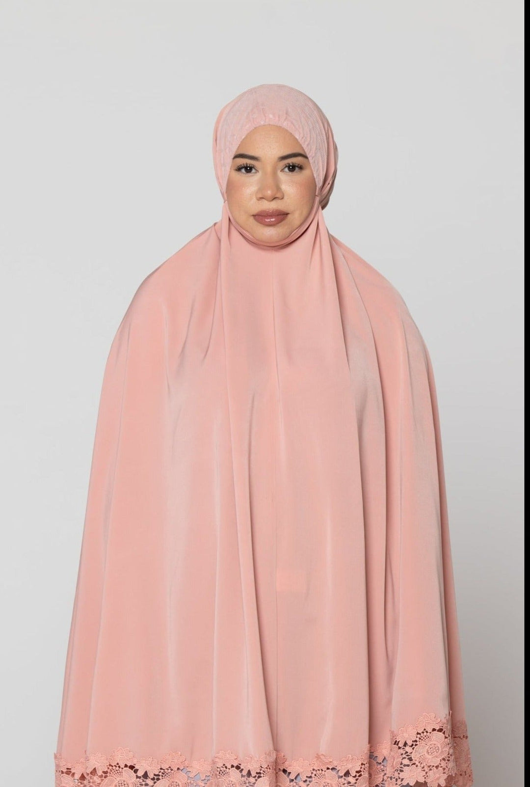 Peach-colored hijab with lace trim from the Coral Two Piece Lace Salah Prayer Outfit