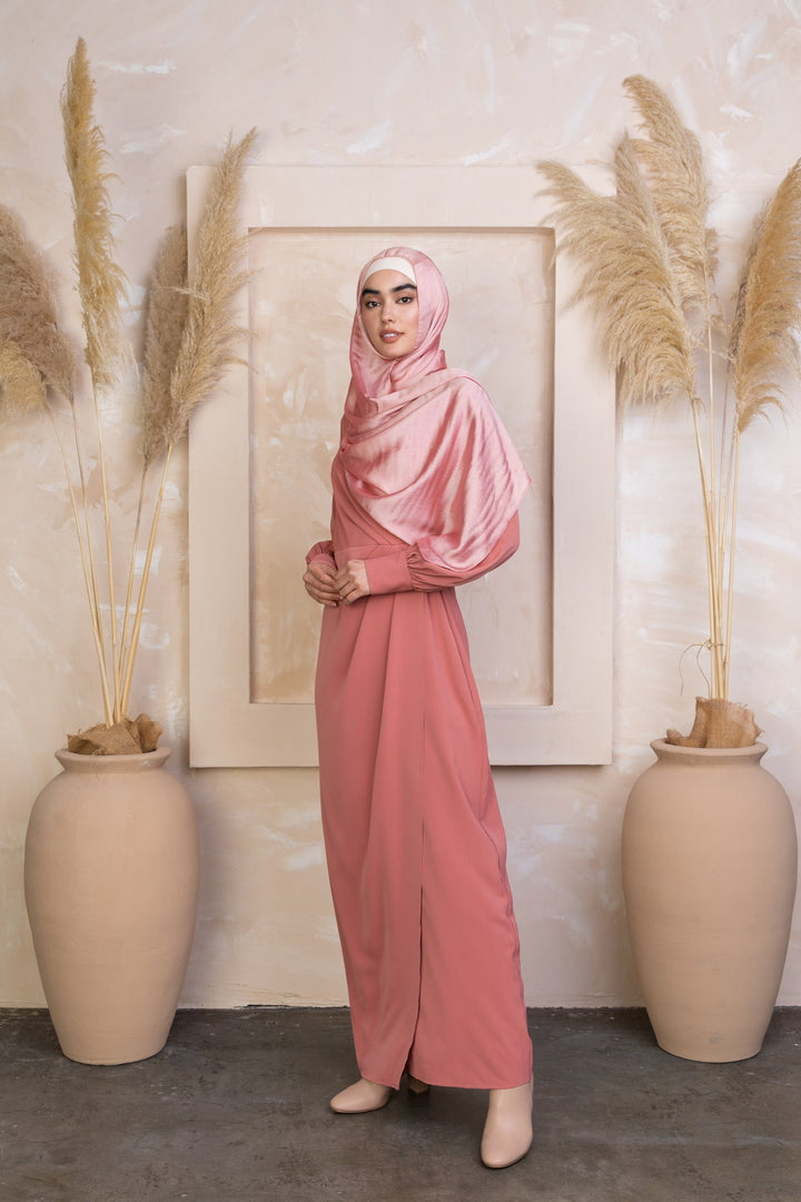 Woman in a pink modest dress and hijab wearing a Coral Wrap Maxi Dress