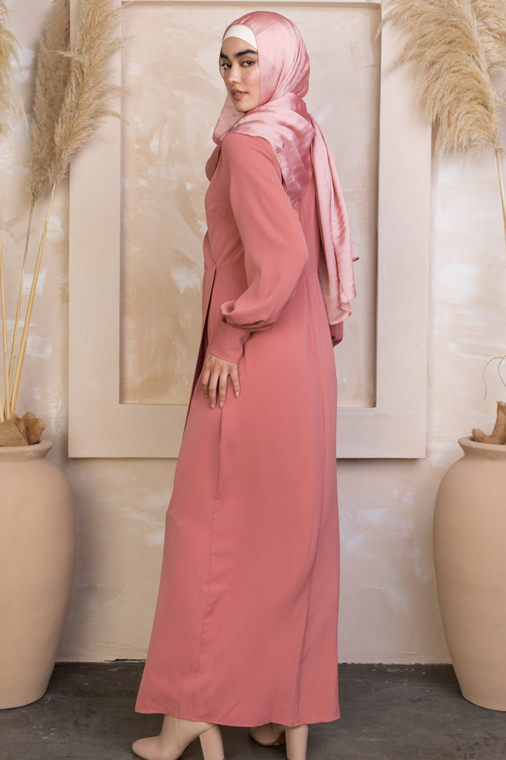 Long-sleeved pink modest Coral Wrap Maxi Dress with matching hijab for elegant style