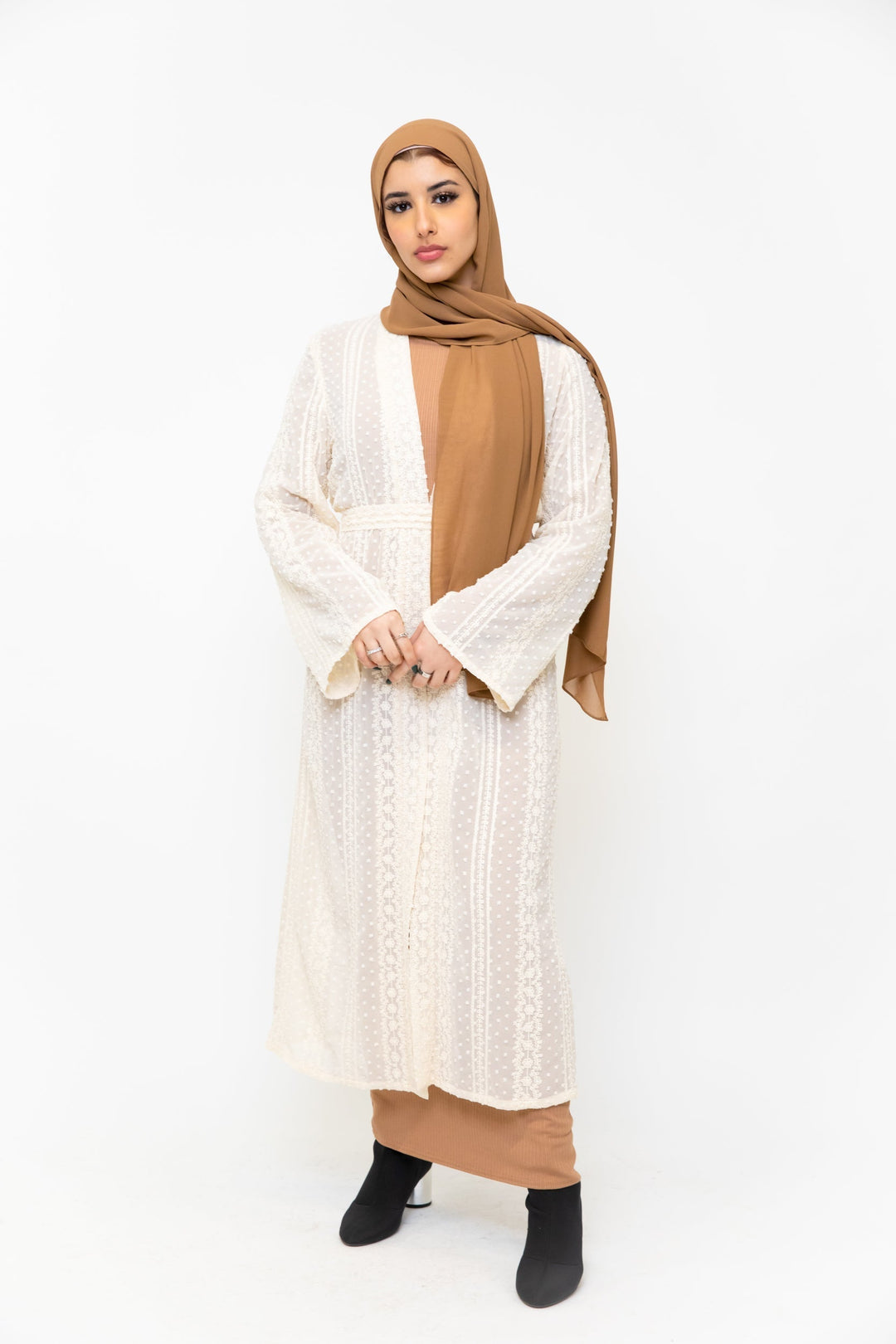 Woman in modest fashion wearing a Cream Boho Lace Embroidered Sheer Midi Cardigan