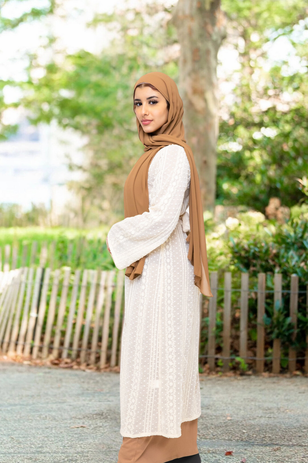 Woman in hijab wearing Cream Boho Lace Embroidered Sheer Midi Cardigan and white dress