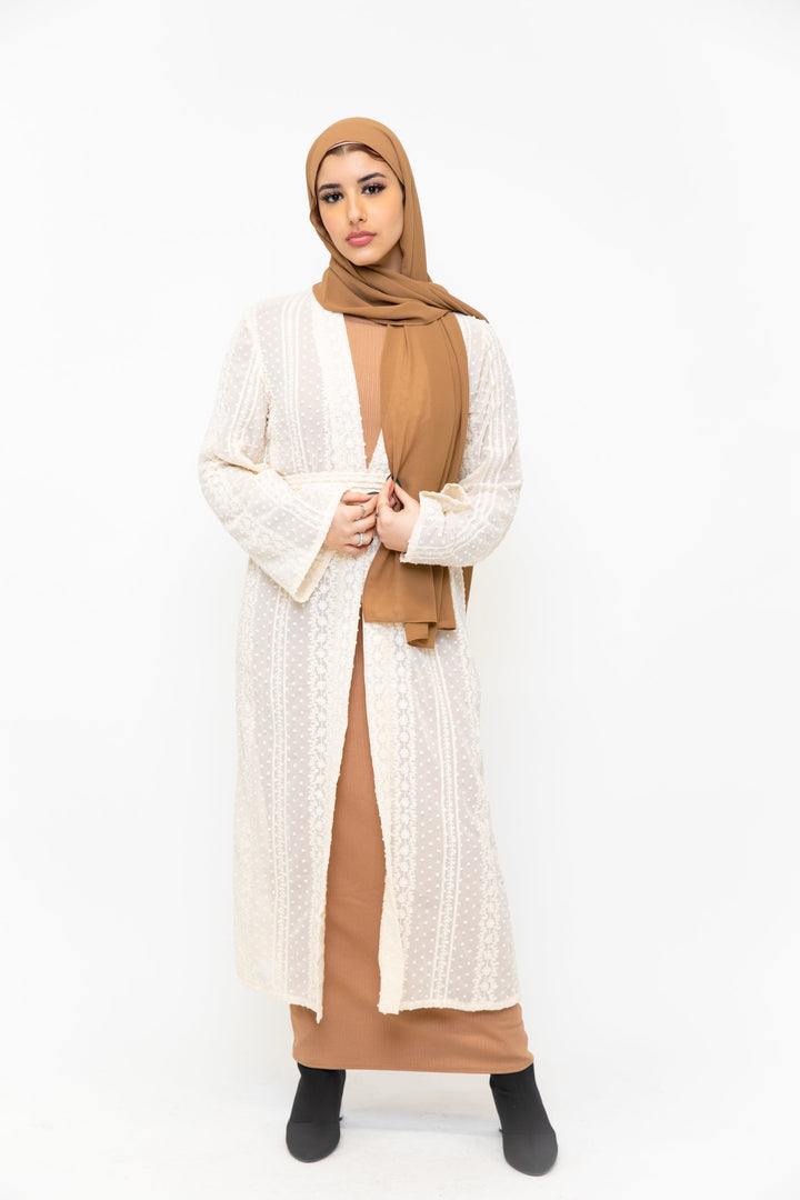 Woman in cream Boho lace embroidered sheer midi cardigan showcasing modest fashion