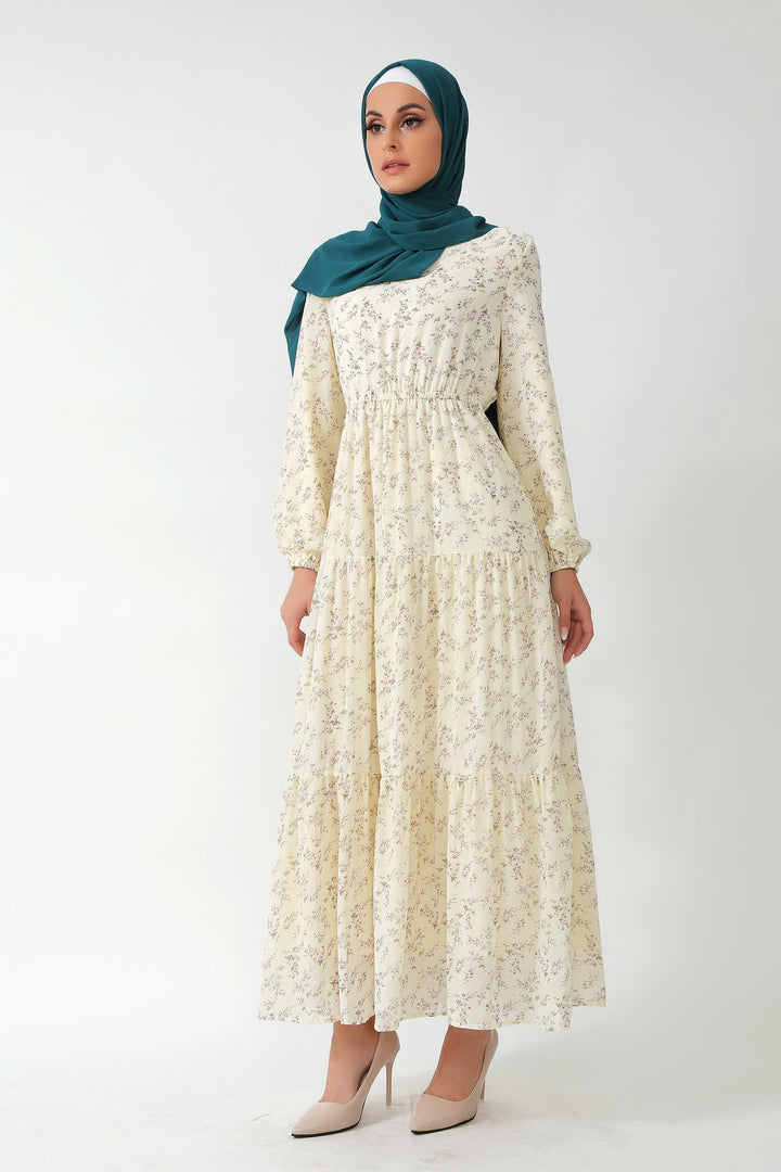 Cream Floral Tiered Maxi Dress featuring a beautiful floral print and tiered design