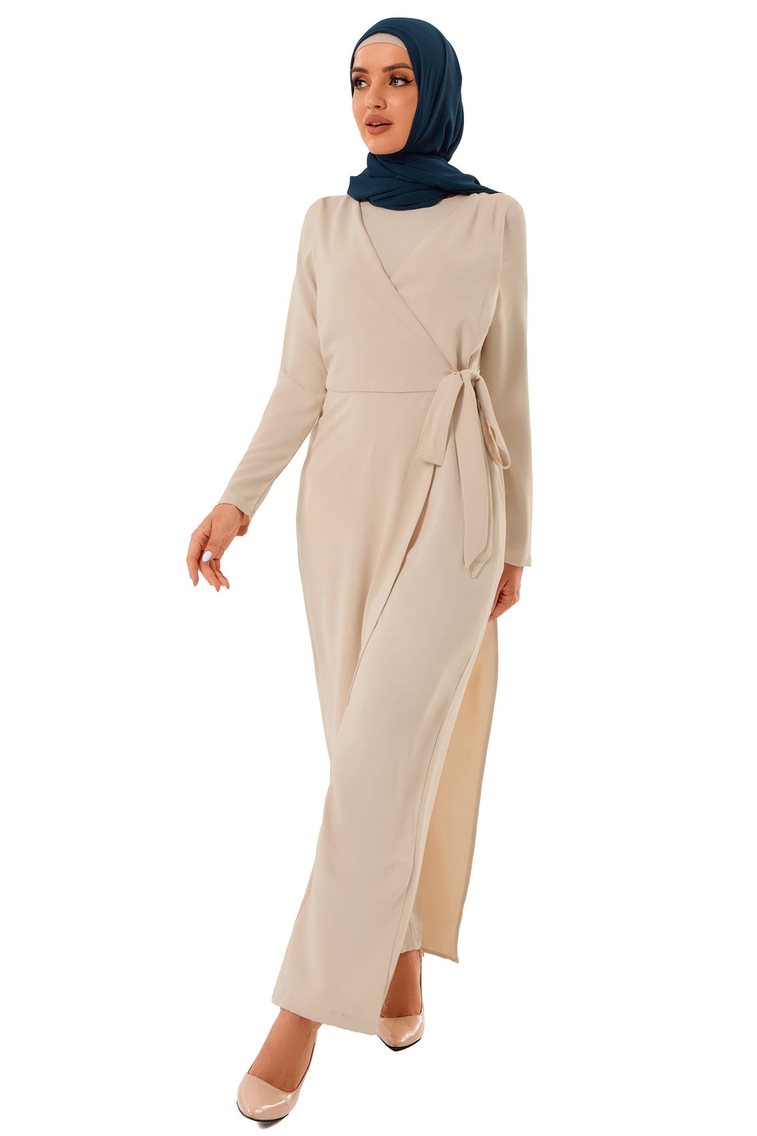 Beige wrap maxi dress with long sleeves and dark teal hijab paired with knot jumpsuit