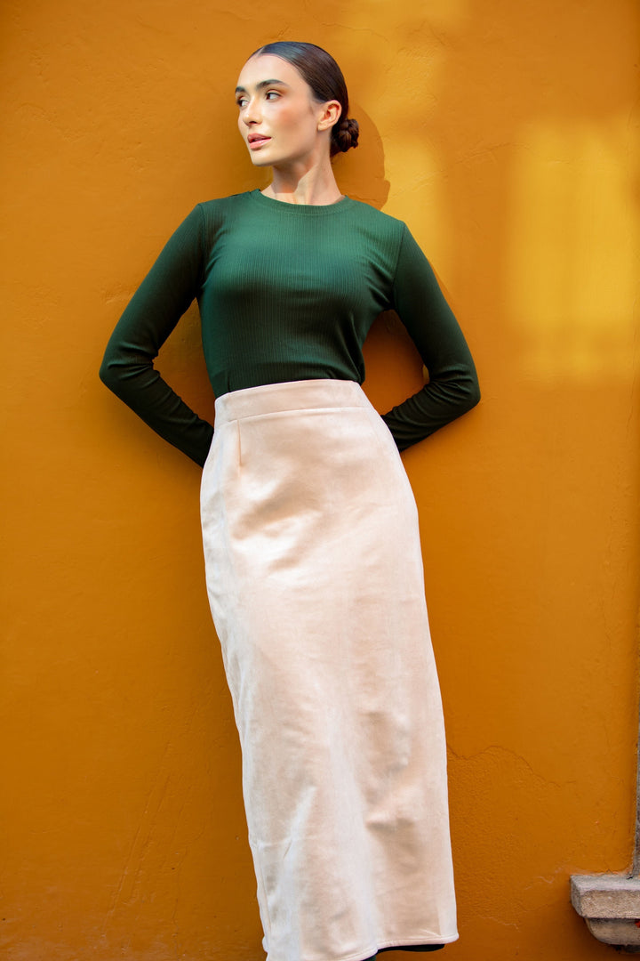 Woman in green top wearing a Cream Suede Pencil Maxi Skirt for CLEARANCE sale