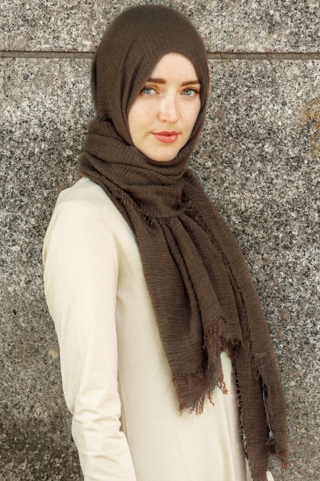 Brown hijab paired with a cream dress, ideal for a stylish head scarf or abaya look