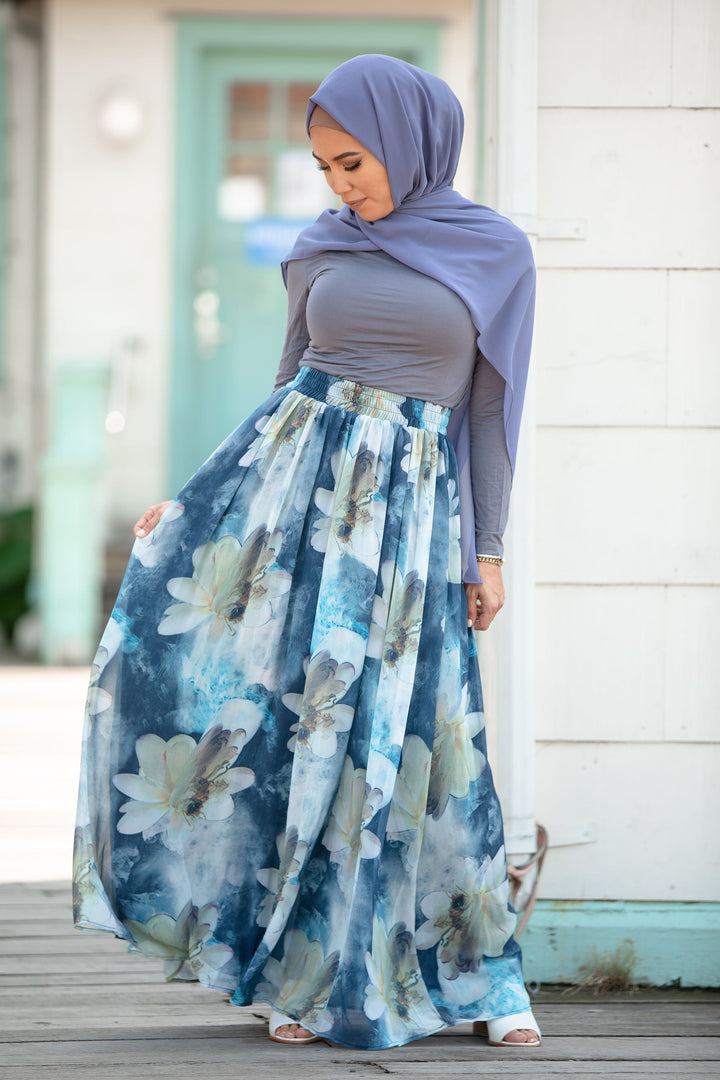 Woman in hijab wearing Day Dreams Floral Maxi Skirt on clearance sale