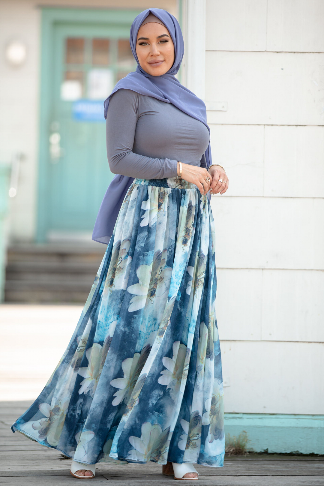 Woman in hijab wearing Day Dreams Floral Maxi Skirt in vibrant floral design