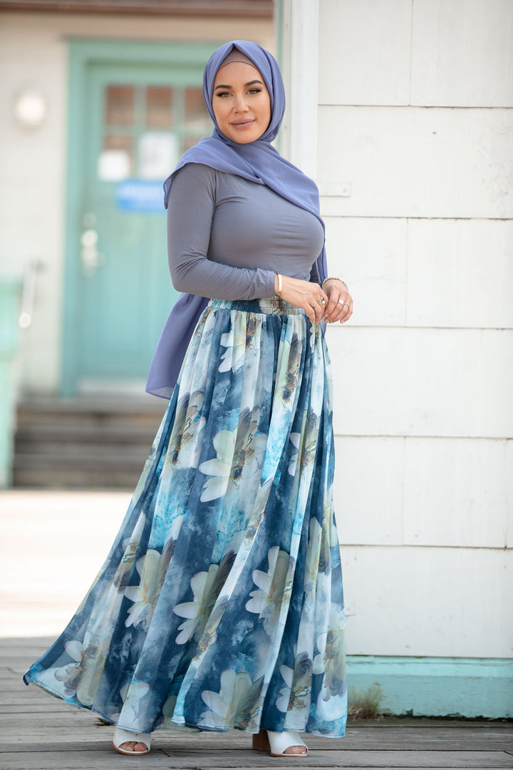 Woman in hijab wearing a Day Dreams Floral Maxi Skirt on clearance sale