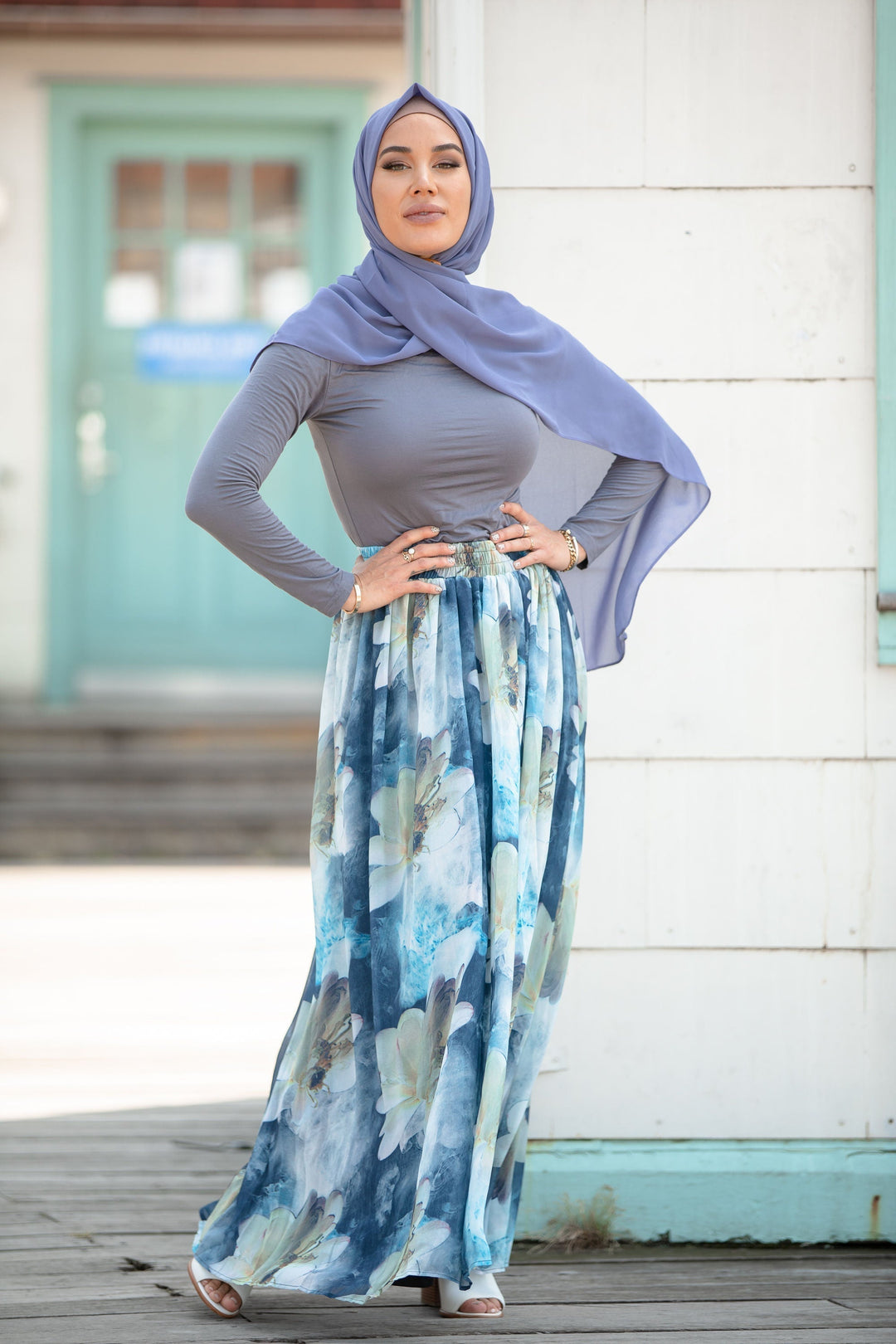 Woman in hijab wearing Day Dreams Floral Maxi Skirt in a vibrant floral design