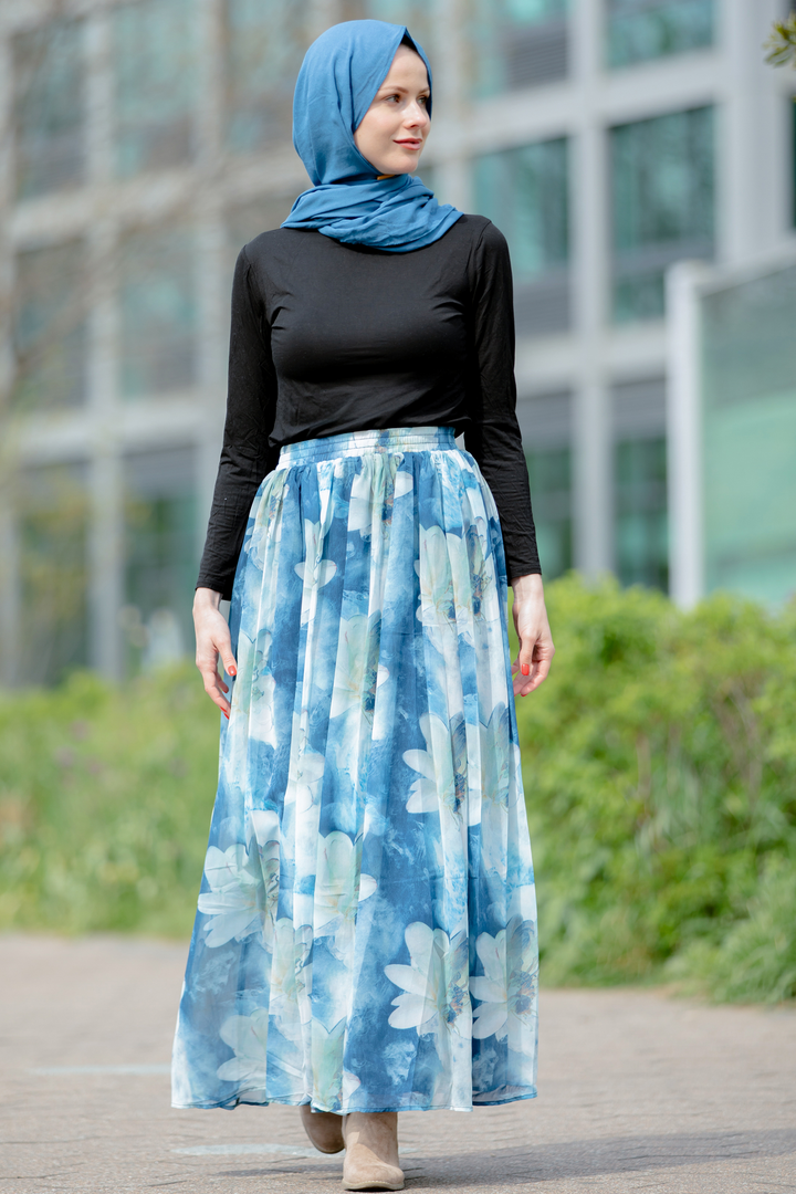 Woman in hijab wearing Day Dreams Floral Maxi Skirt on clearance sale