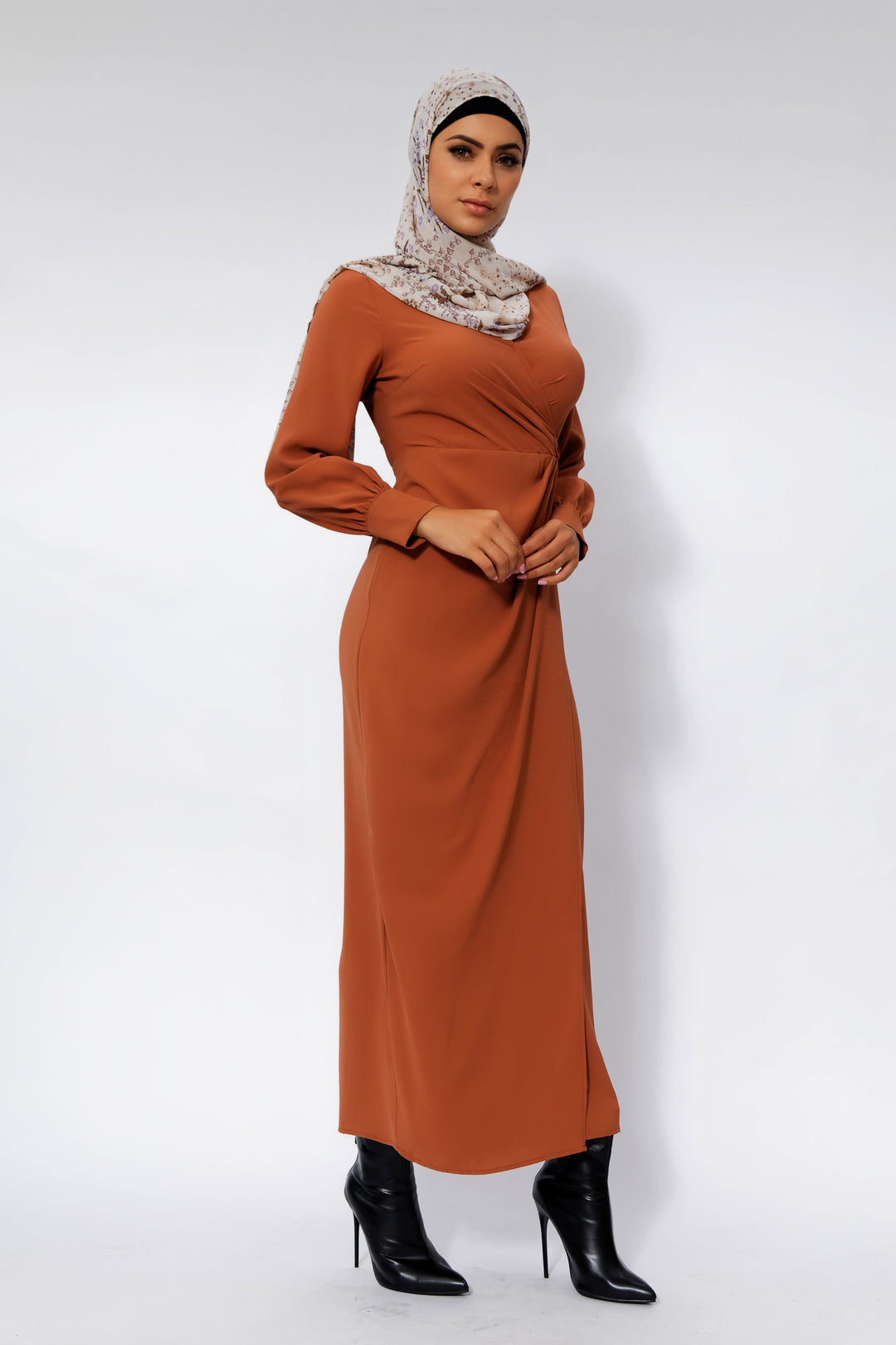 Woman in Deep Cider Wrap Maxi Dress with criss cross neckline and patterned hijab