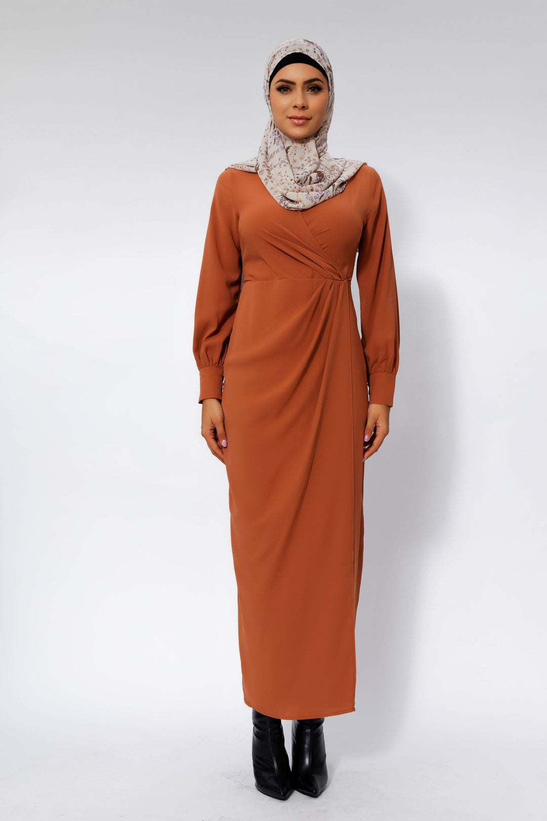 Woman in a brown hijab wearing a Deep Cider Wrap Maxi Dress with criss cross neckline