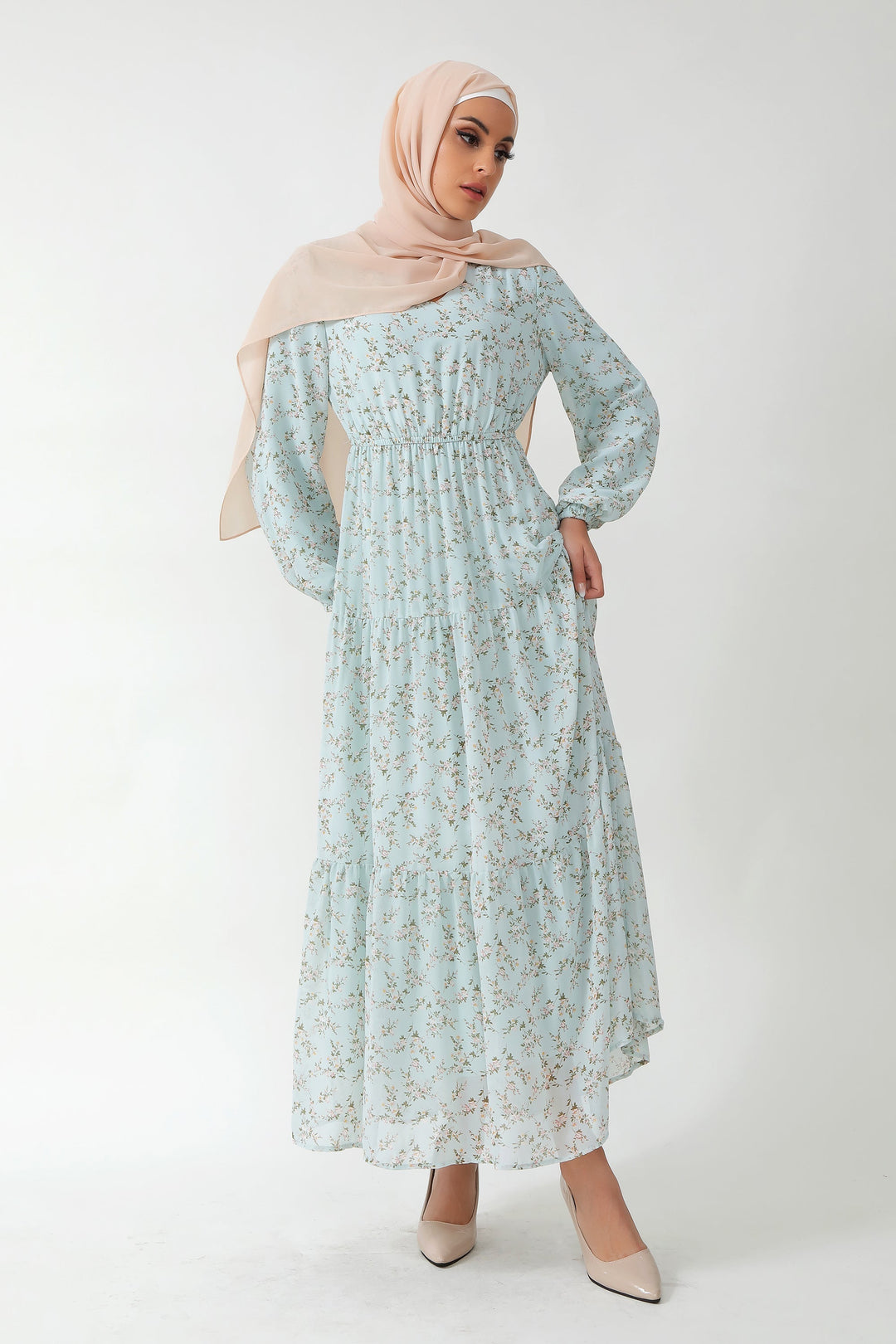 Woman in Dreamy Blue Floral Tiered Maxi Dress wearing a stylish hijab