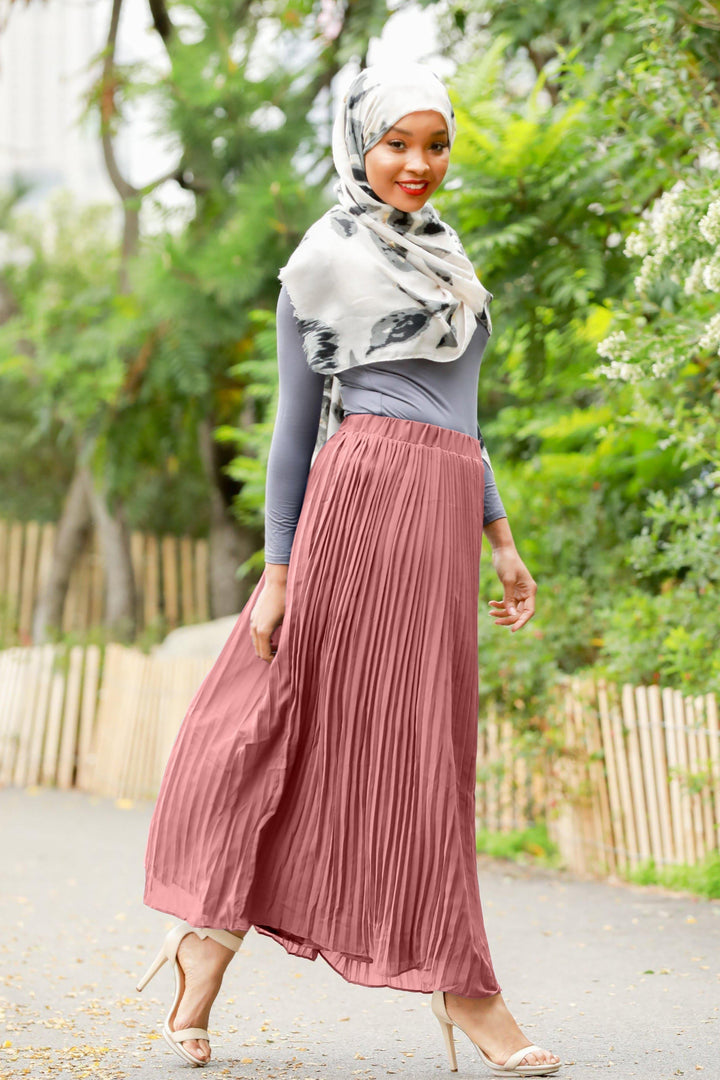 Woman in hijab wearing a Dusty Pink Pleated Chiffon Maxi Skirt with elastic waistband