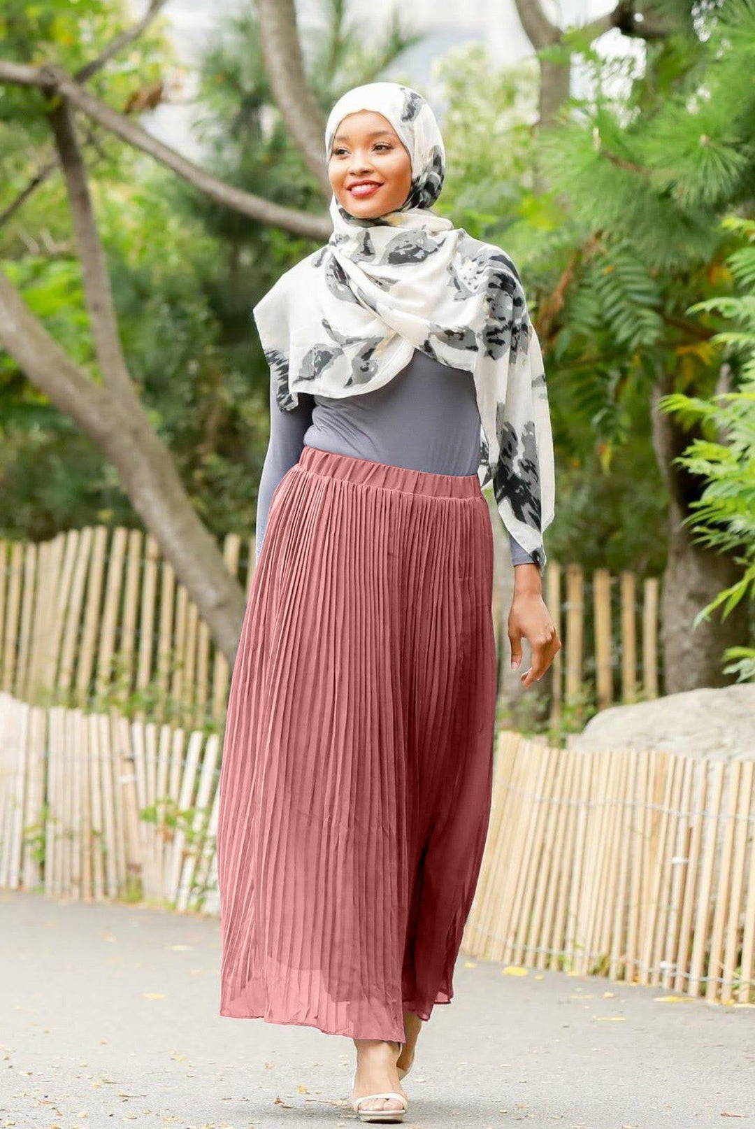 Woman in hijab wearing a Dusty Pink Pleated Chiffon Maxi Skirt with elastic waistband