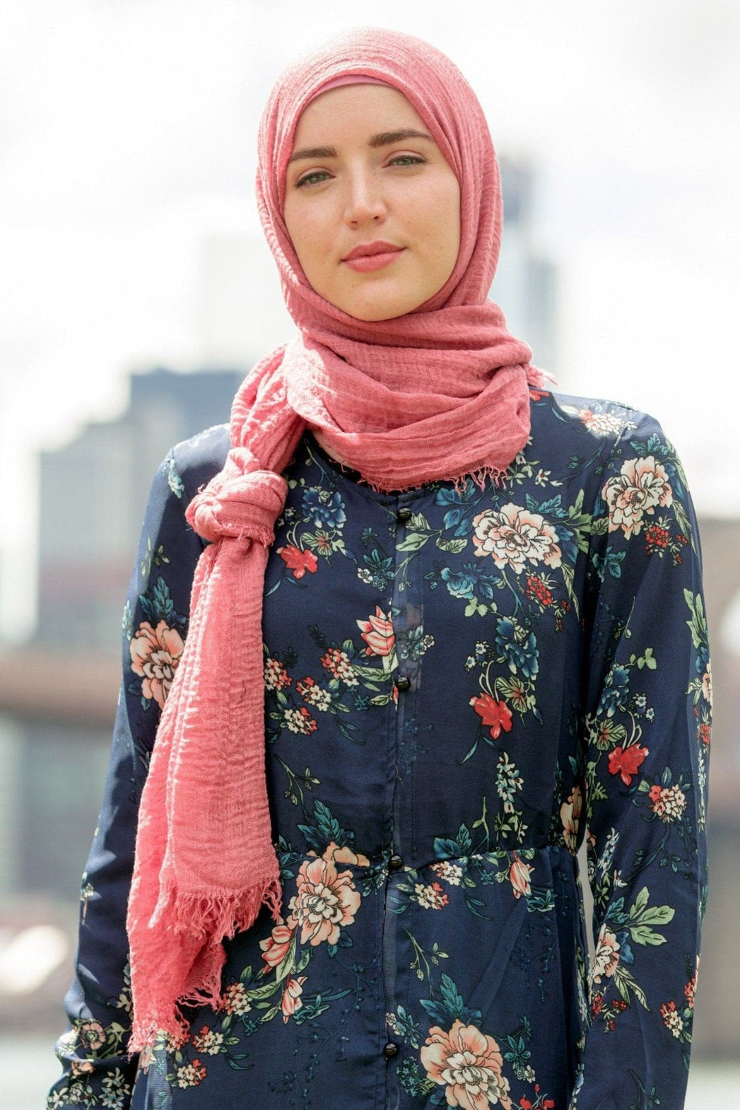 Floral dress paired with a Dusty Rose Cotton Hijab and matching pink scarf