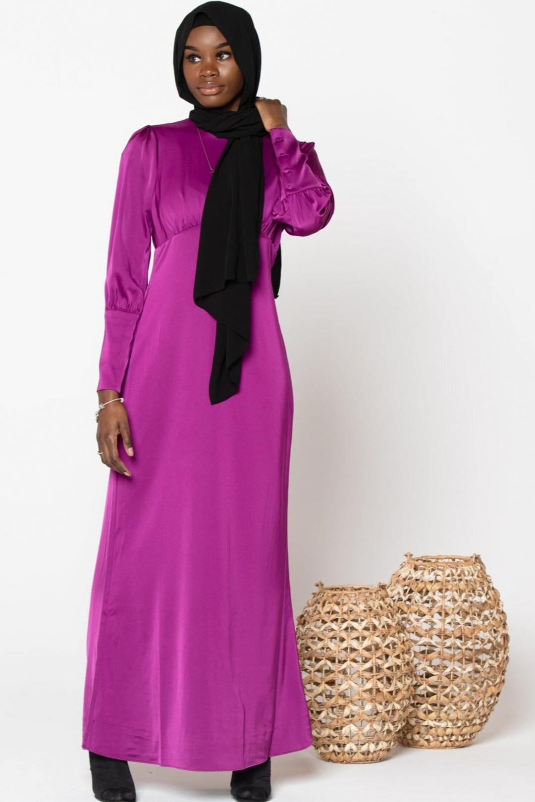 Magenta long-sleeved dress styled as a Fuschia Satin Long Sleeve Maxi Dress