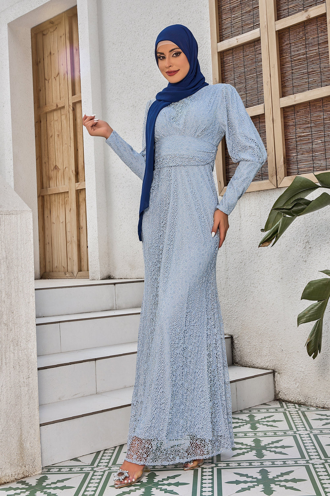 Woman in a light blue lace dress modeling Gray Lace Ruched Waist Long Sleeve Gown