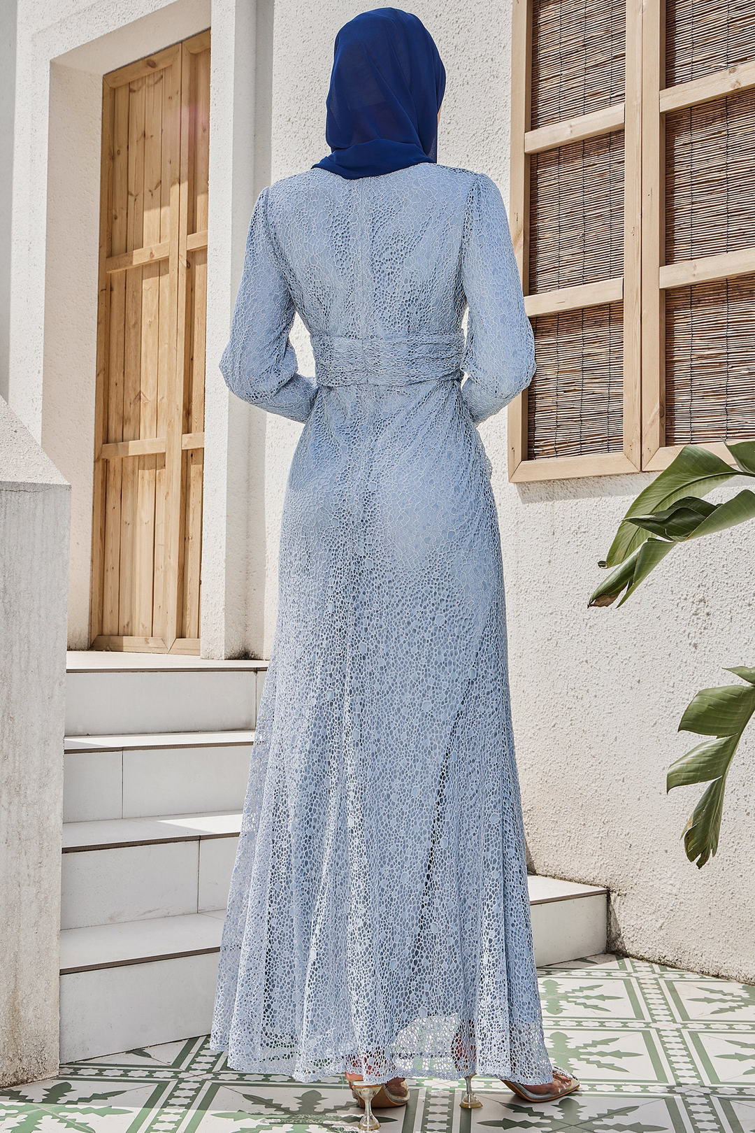 Long-sleeved blue lace dress with hijab styled with gray lace ruched waist gown