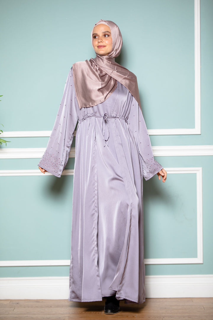 Woman in a lilac satin maxi dress and hijab showcasing Gray Satin Drawstring Abaya