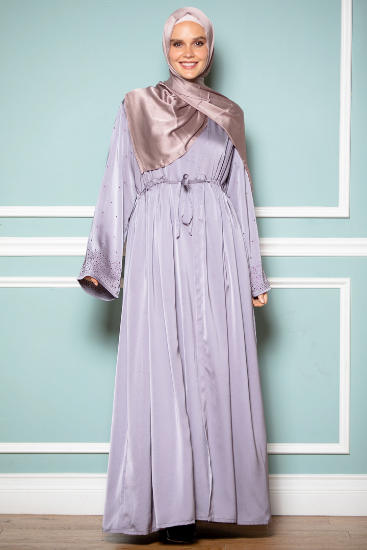 Woman in lilac maxi dress and headscarf showcasing Gray Satin Drawstring Open Front Abaya