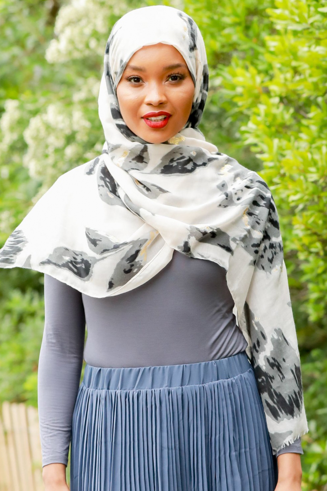 Woman in a patterned hijab wearing a Gray Turtle Neck Top for casual style