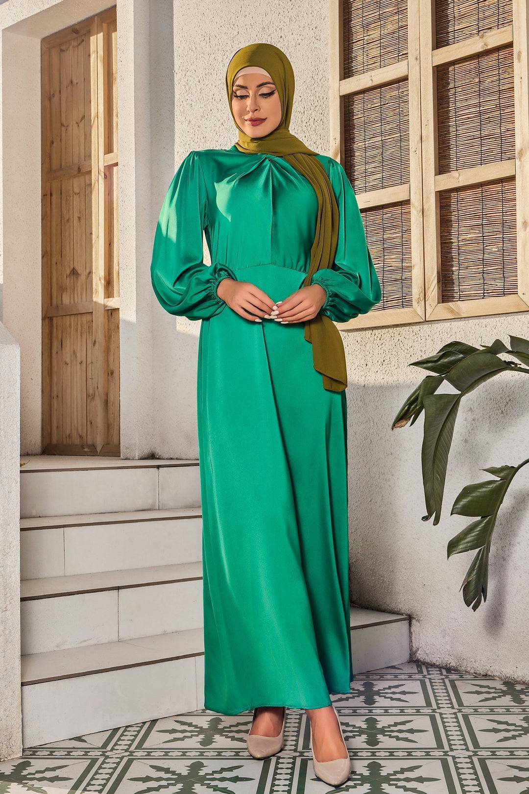 Emerald green modest dress featuring a criss cross satin design on clearance