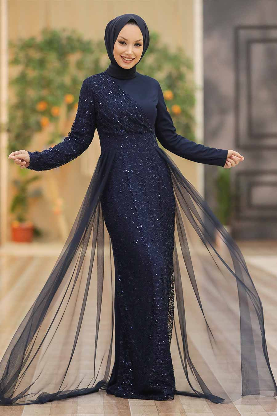 Elegant navy blue sequined Hayati Lace chiffon overlay gown with tulle train