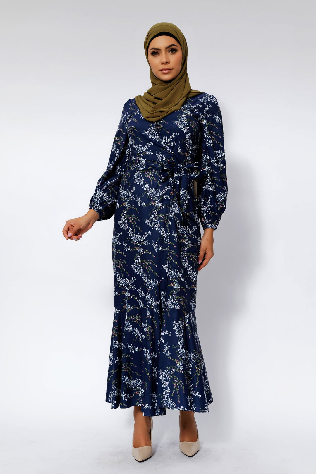 Woman in Heavenly Blue Floral Ruffle Faux Wrap Maxi Dress with hijab