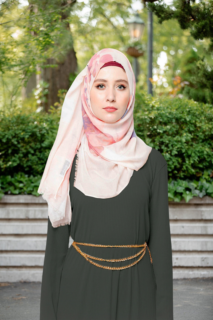 Woman in a floral hijab and gold chain belt styled with a Hunter Green Ribbed Long Sleeve Maxi Dress