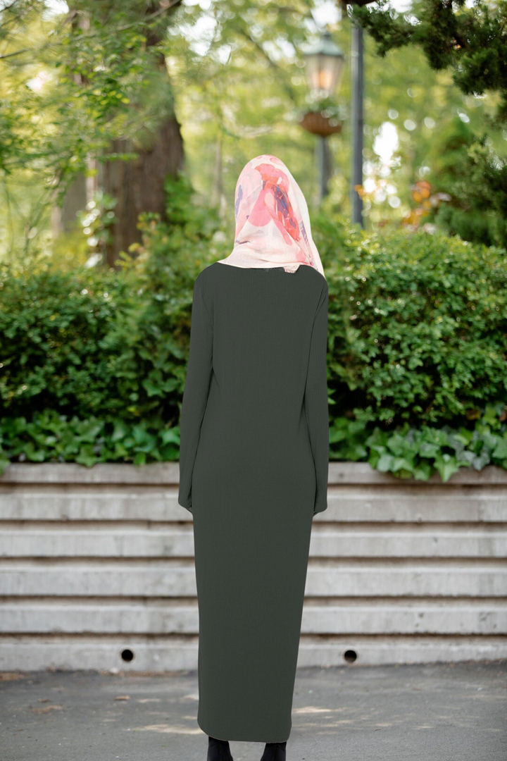 Long Sleeve Maxi Dress in Hunter Green paired with a pink hijab for a stylish look