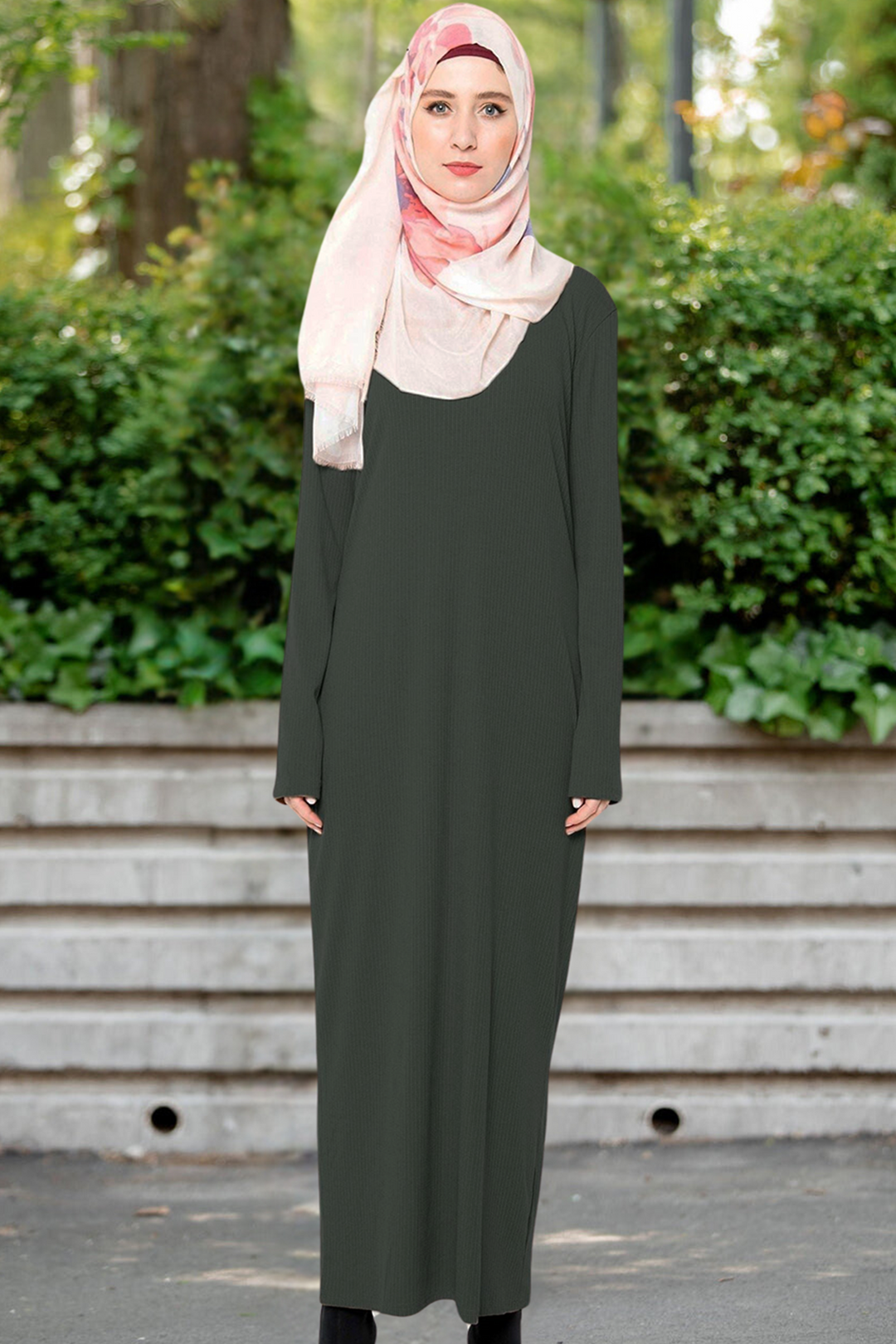 Woman in dark green dress and light pink hijab wearing Hunter Green Ribbed Maxi Dress