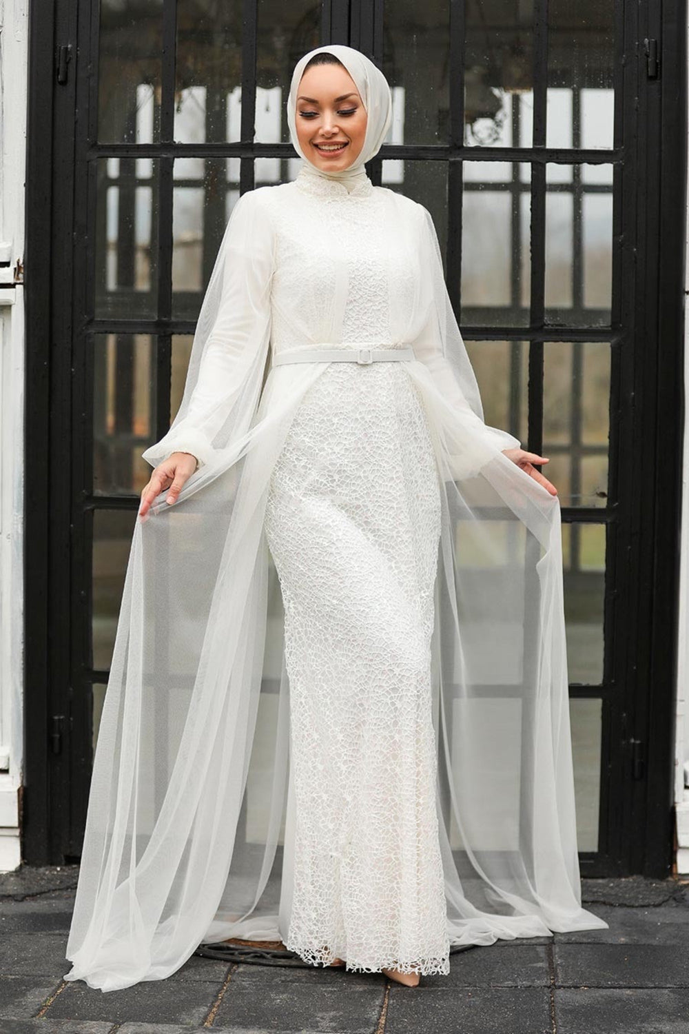 Elegant Ivory Lace gown with Chiffon Overlay and a stylish cape design