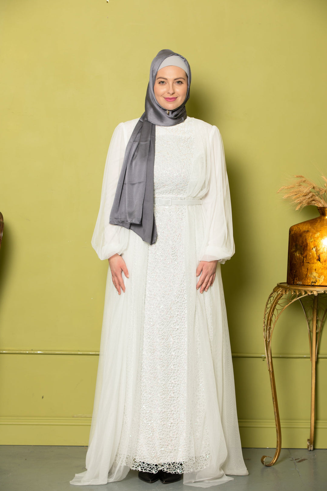 Elegant Ivory Lace with Chiffon Overlay Gown paired with a Gray Hijab