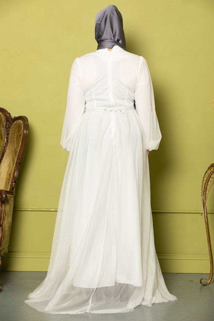 White modest dress with long sleeves featuring an Ivory Lace with Chiffon Overlay Gown