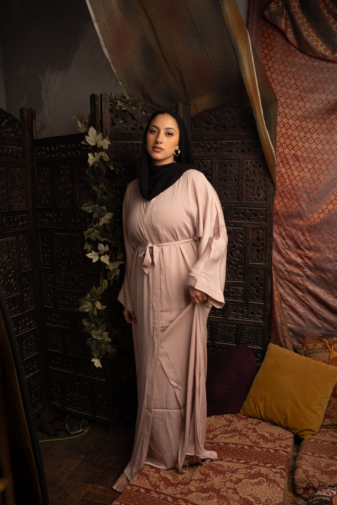 Woman in a light pink robe with a Khaki Sleeveless Dress and Open Abaya Set