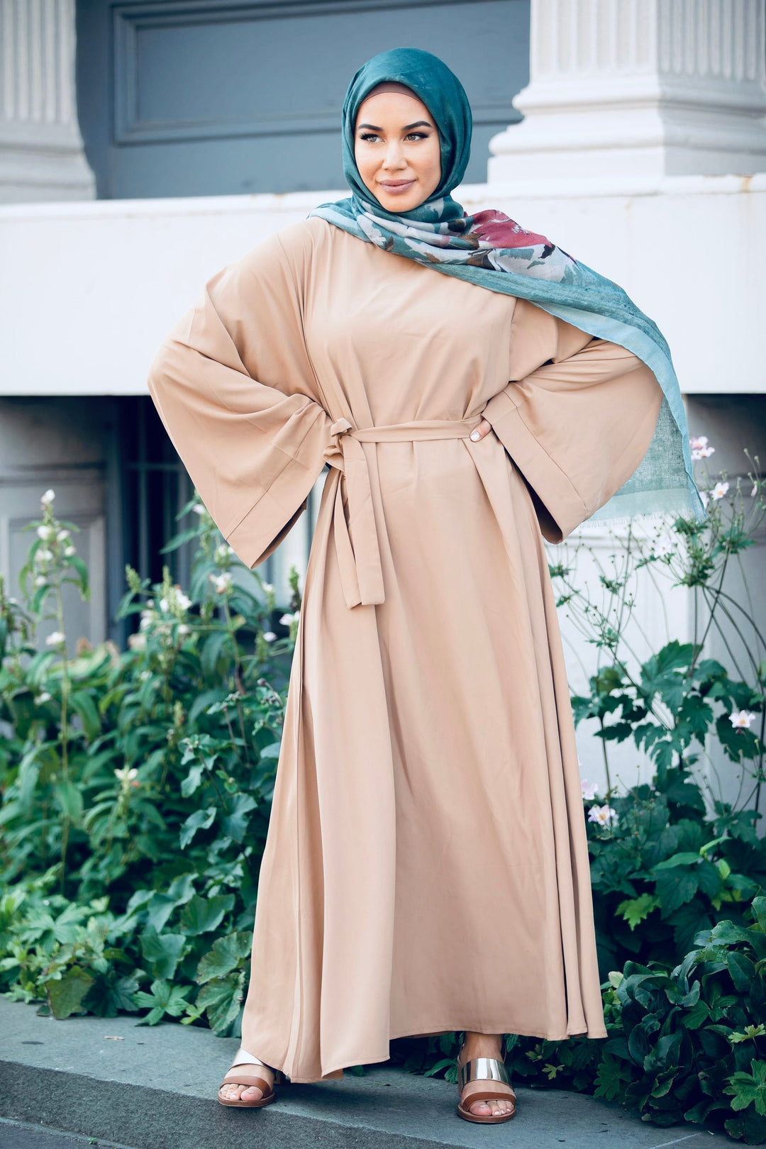 Woman in a beige Kimono Long Sleeve Maxi Dress with a fabric tie belt and teal hijab