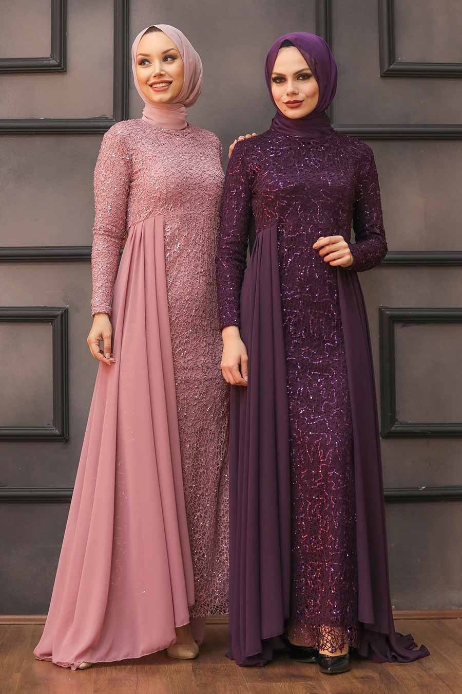 Two women in embellished maxi dresses with headscarves and skirt overlays