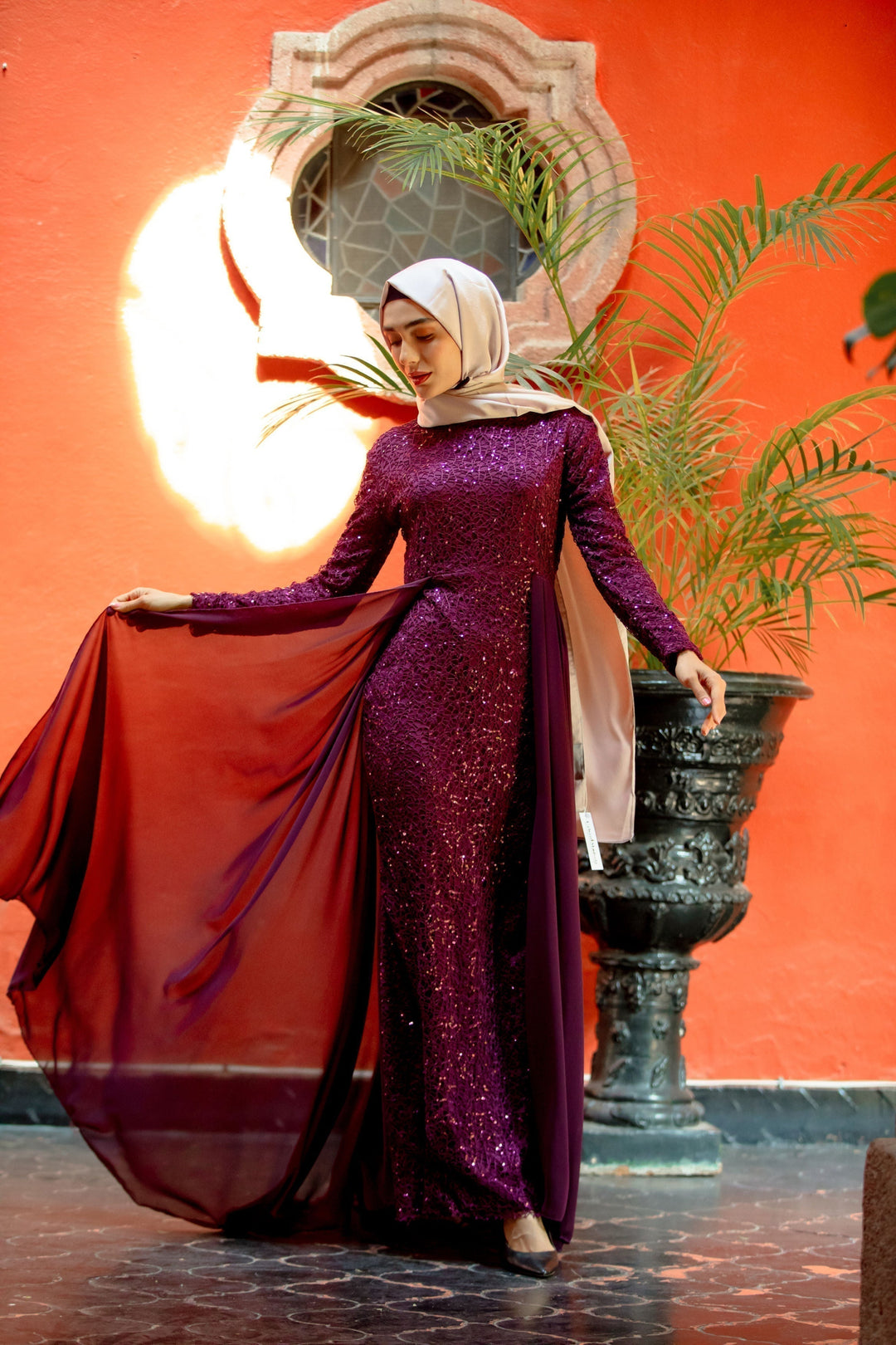 Elegant purple sequined gown with hijab and skirt overlay in attached chiffon design