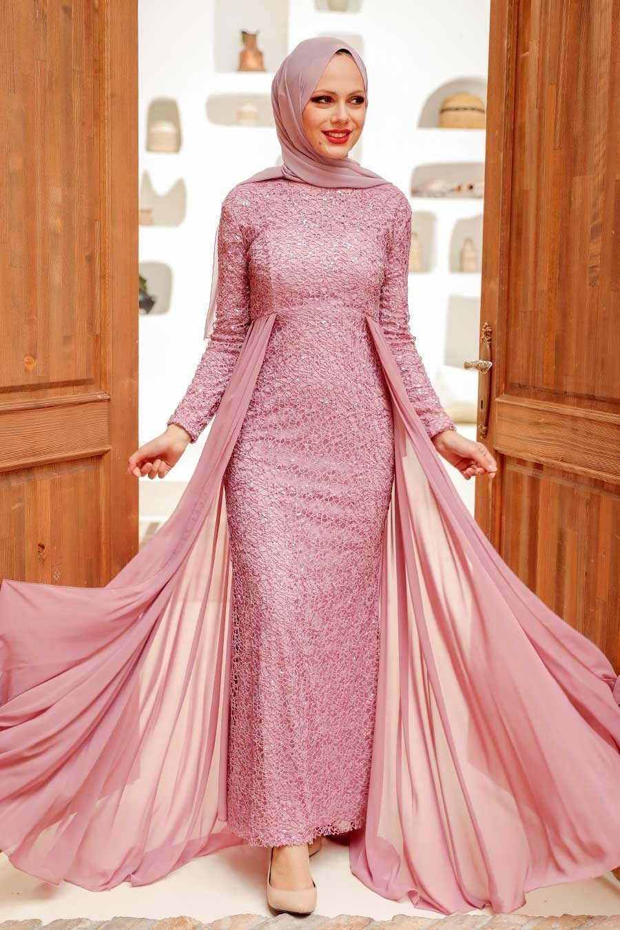 Long-sleeved pink lace gown with chiffon skirt overlay for a stunning maxi dress look