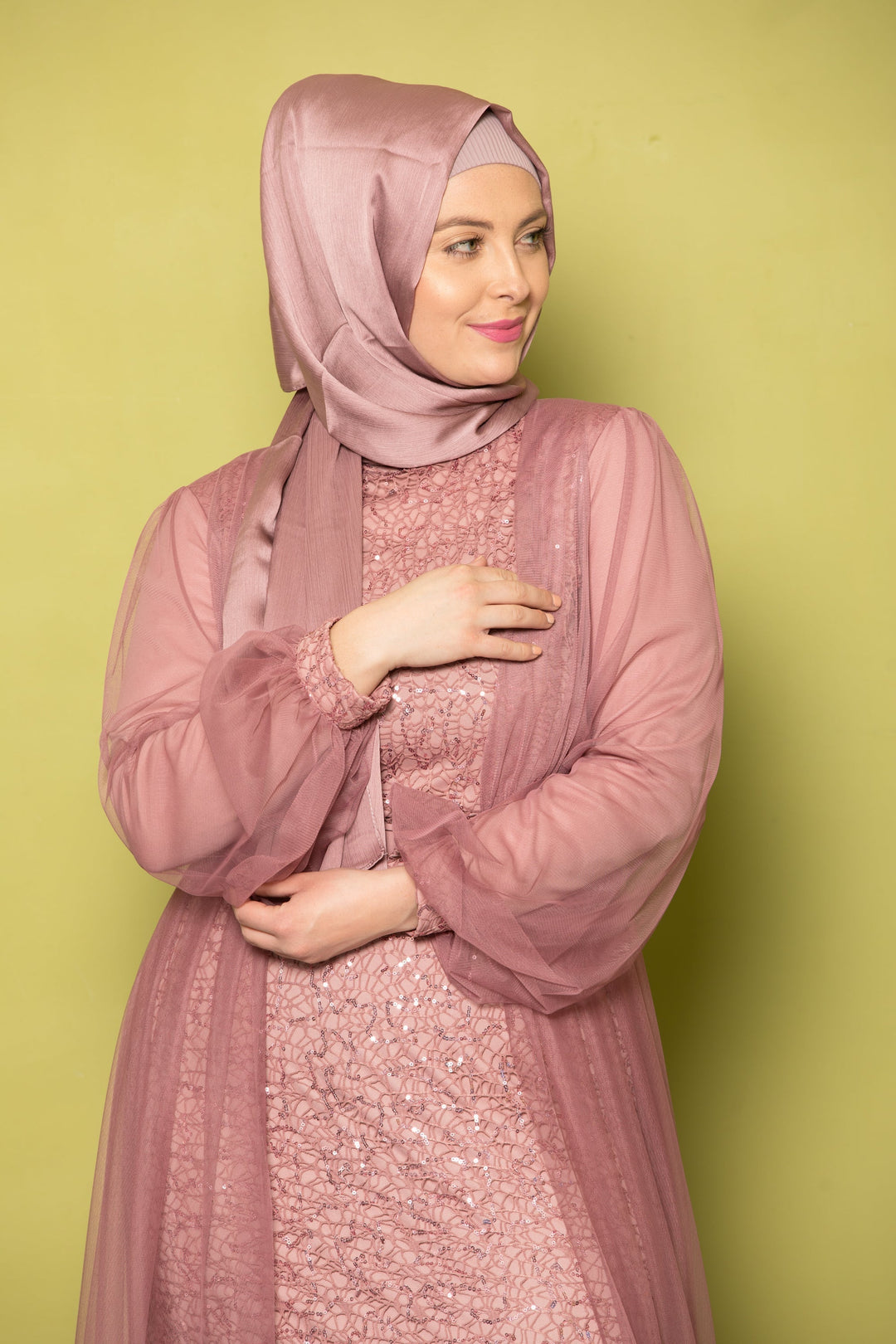 Woman in a pink hijab wearing a Lace With Chiffon Overlay Gown