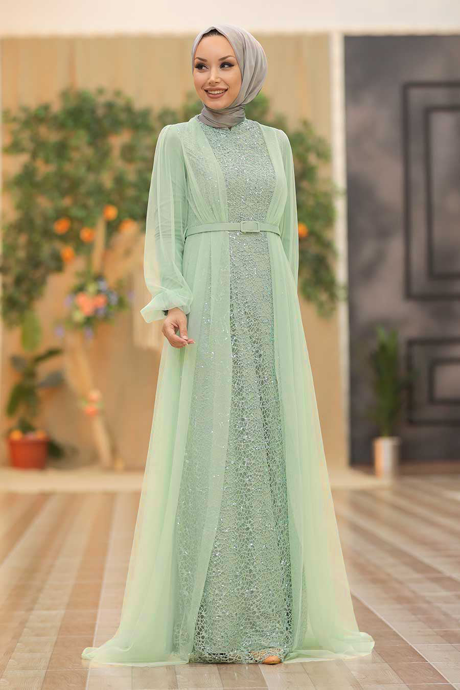 Mint green lace chiffon overlay gown with hijab for a modest and elegant look