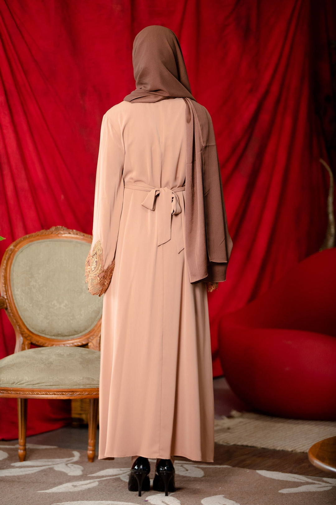 Woman in brown hijab wearing Latte Lace Sleeve Front Zipper Abaya Dress with kimono sleeves