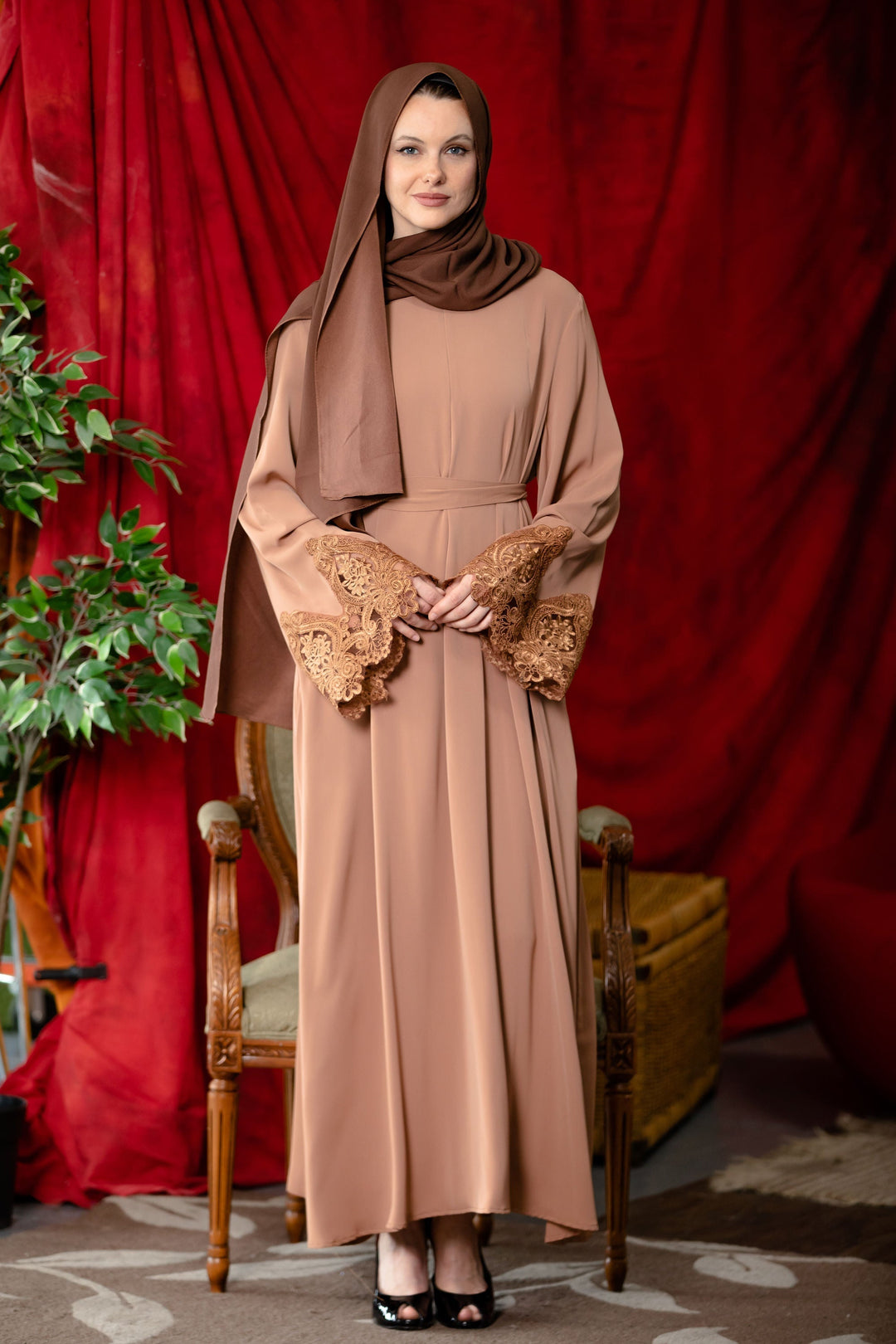 Woman in brown modest zipper abaya dress with lace kimono sleeves on clearance