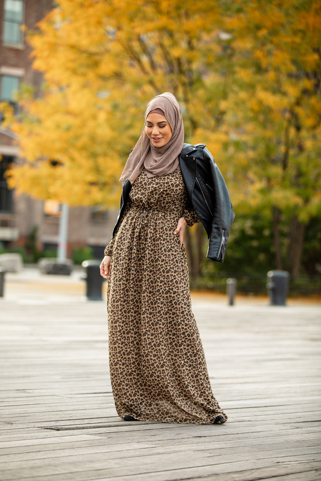 Leopard Print Drawstring Long Sleeve Maxi Dress styled with a hijab and leather jacket