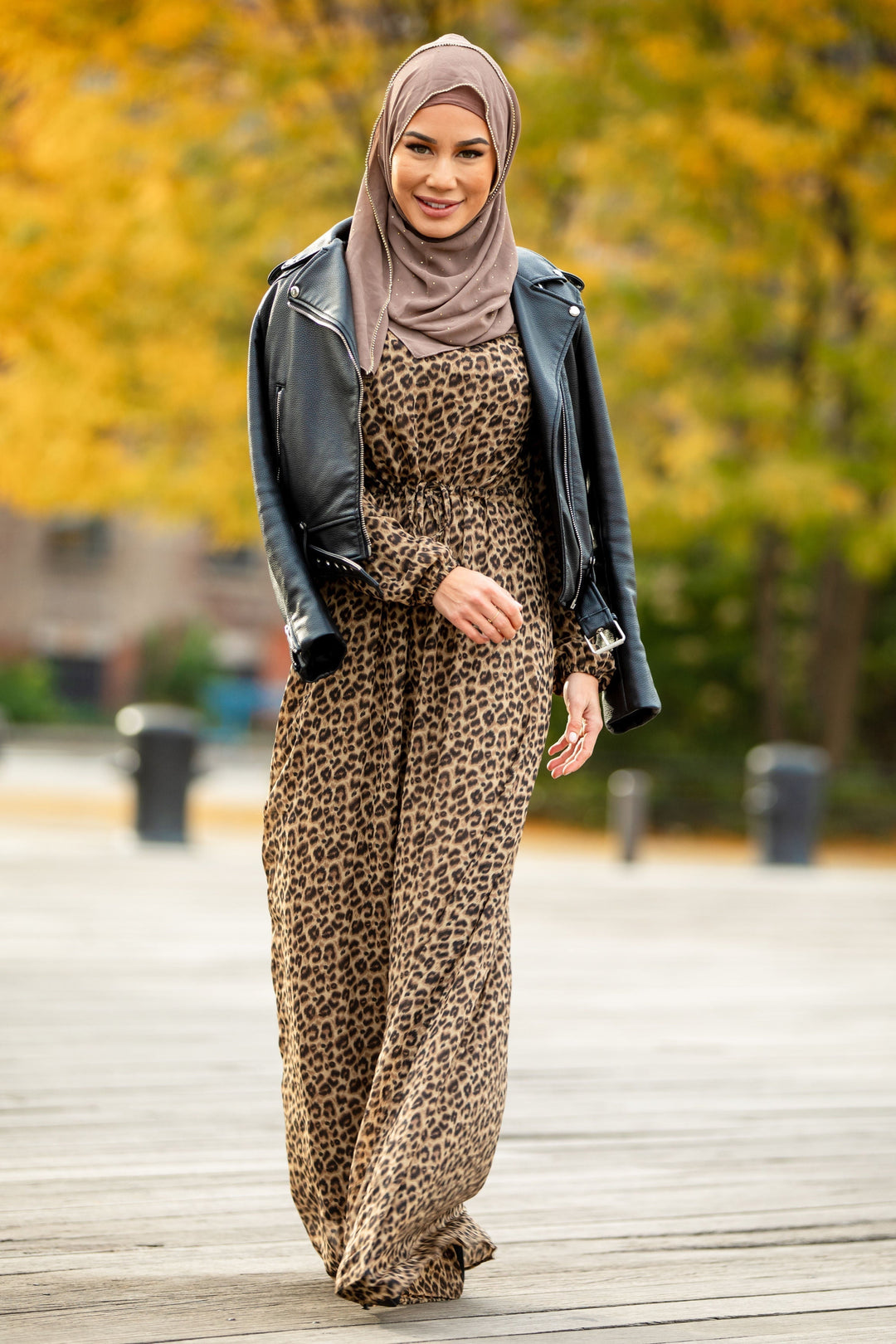 Leopard Print Drawstring Long Sleeve Maxi Dress with elastic cuffs, styled with hijab and leather jacket