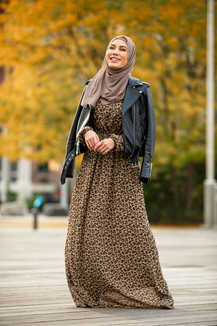 Leopard Print Drawstring Long Sleeve Maxi Dress with elastic cuffs, hijab, and leather jacket